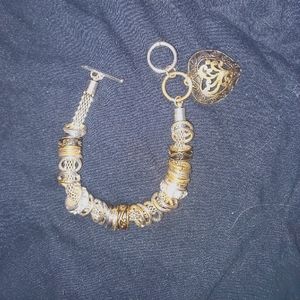 Gold and silver charm bracelet